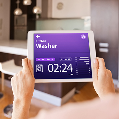 Tablet device showing being connected to washing machine device