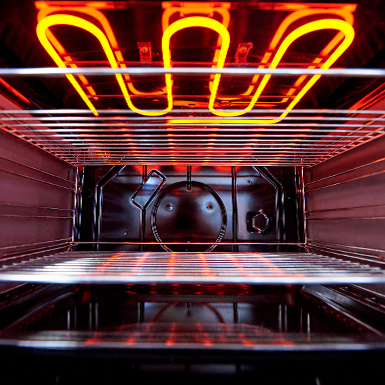Inside of an oven heating up