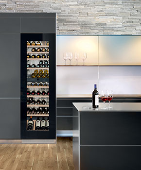 Wine cabinet with wine and cheese